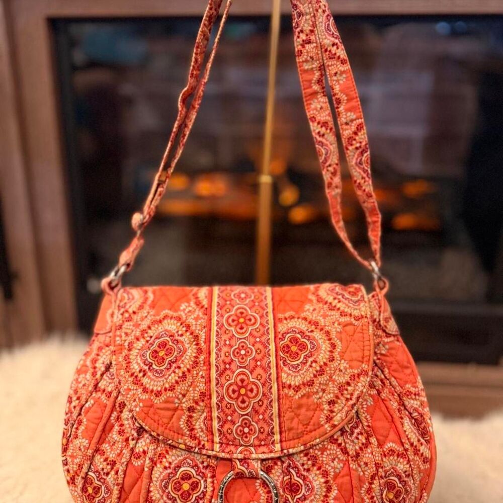 Vera Bradley saddle bag in the pattern Paprika